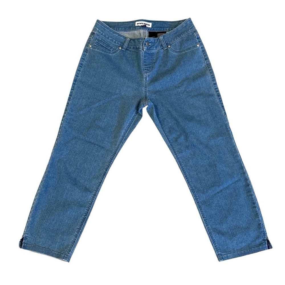 Nygard pull on medium wash stretch denim capris with side slits. Women's 10